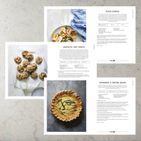Magnolia Table Cookbook with hard cover by Joanna Gaines. Image shows examples Peach Caprese, Chocolate Chip Cookies and Asparagus & Fontina Quiche.