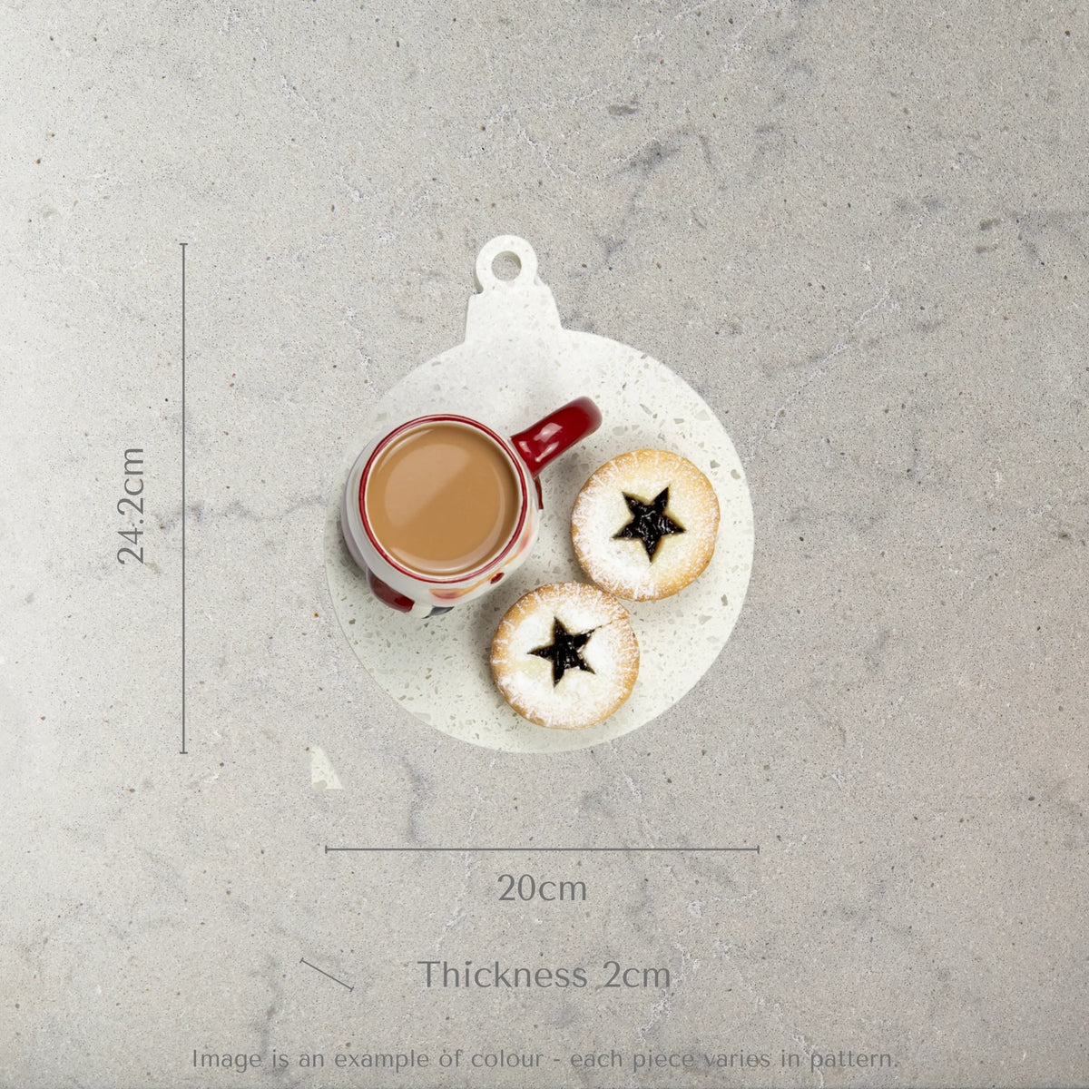 Measurement chart showing a ceramic trivet christmas shape with a cup and cookies, dimensions on a light gray background.