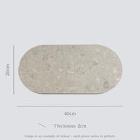 Double arch quartz serving platter in Caesarstone Clamshell™ created by Aureliia Collection. Unstyled food platter shows product colour a beautiful fusion of light grey with white features, underscored by drifting veins on a neutral base. An excellent home decor gift for someone who has it all.